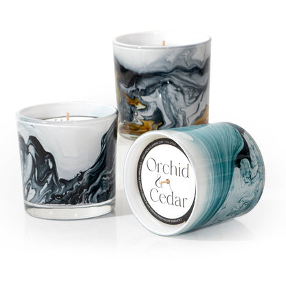 Orchid & Cedar 14 oz. Swirl Glass Candle by Andaluca Home