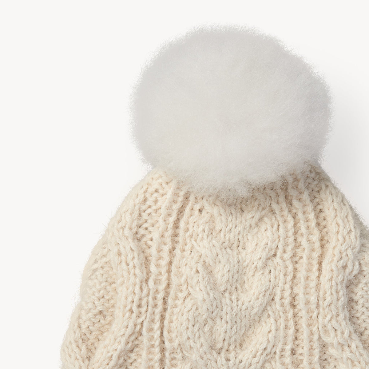 Hand-Knit Alpaca Pom Pom Hat by POKOLOKO